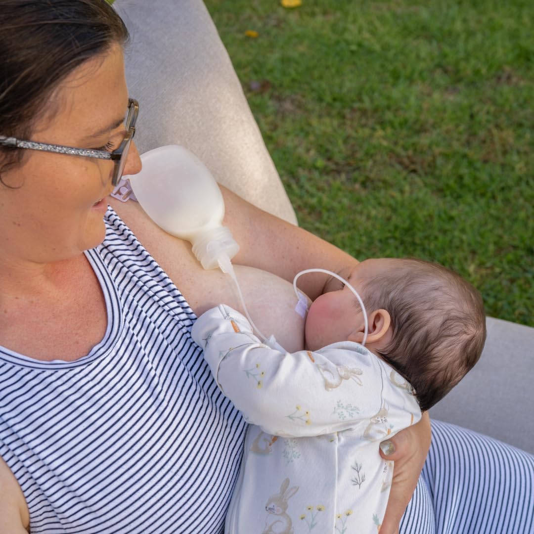Haakaa on-the-go kit image demonstrating portable breastfeeding support.