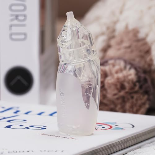 Haakaa Penguin Nasal Aspirator package contents with tips and brush