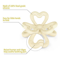 Haakaa silicone clover teether in baby hand demonstrates easy grip for little explorers