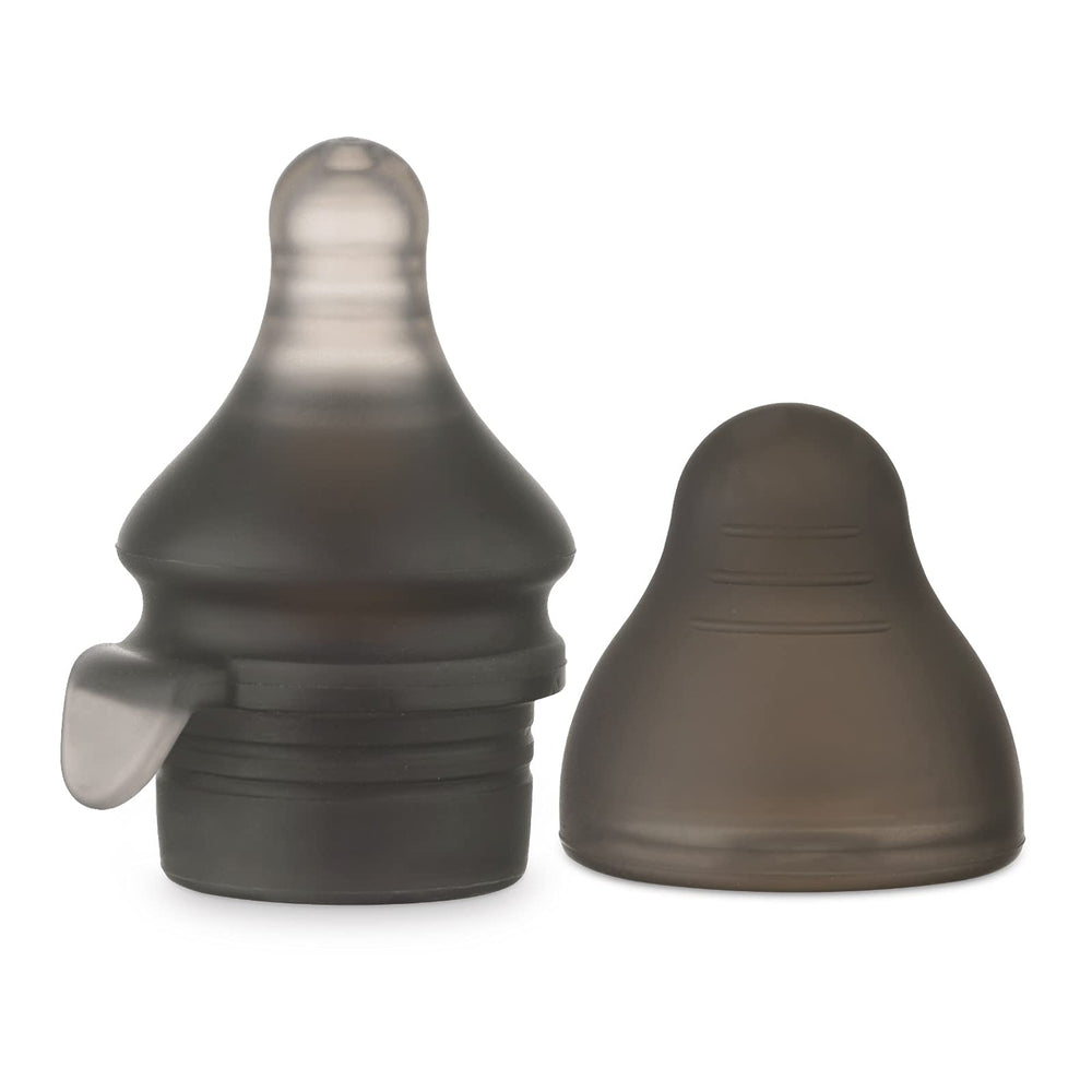 haakaa squeeze and feed attachment nipple in-use showing smooth milk flow from storage bag