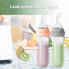 Haakaa squeeze-tube design holds puree safely for quick travel snacks.
