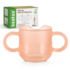 Haakaa training cup with soft silicone for gentle sipping and drop-proof durability.