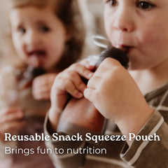 Haakaa Yummy Pouch squeezed by tiny hands to support self-feeding