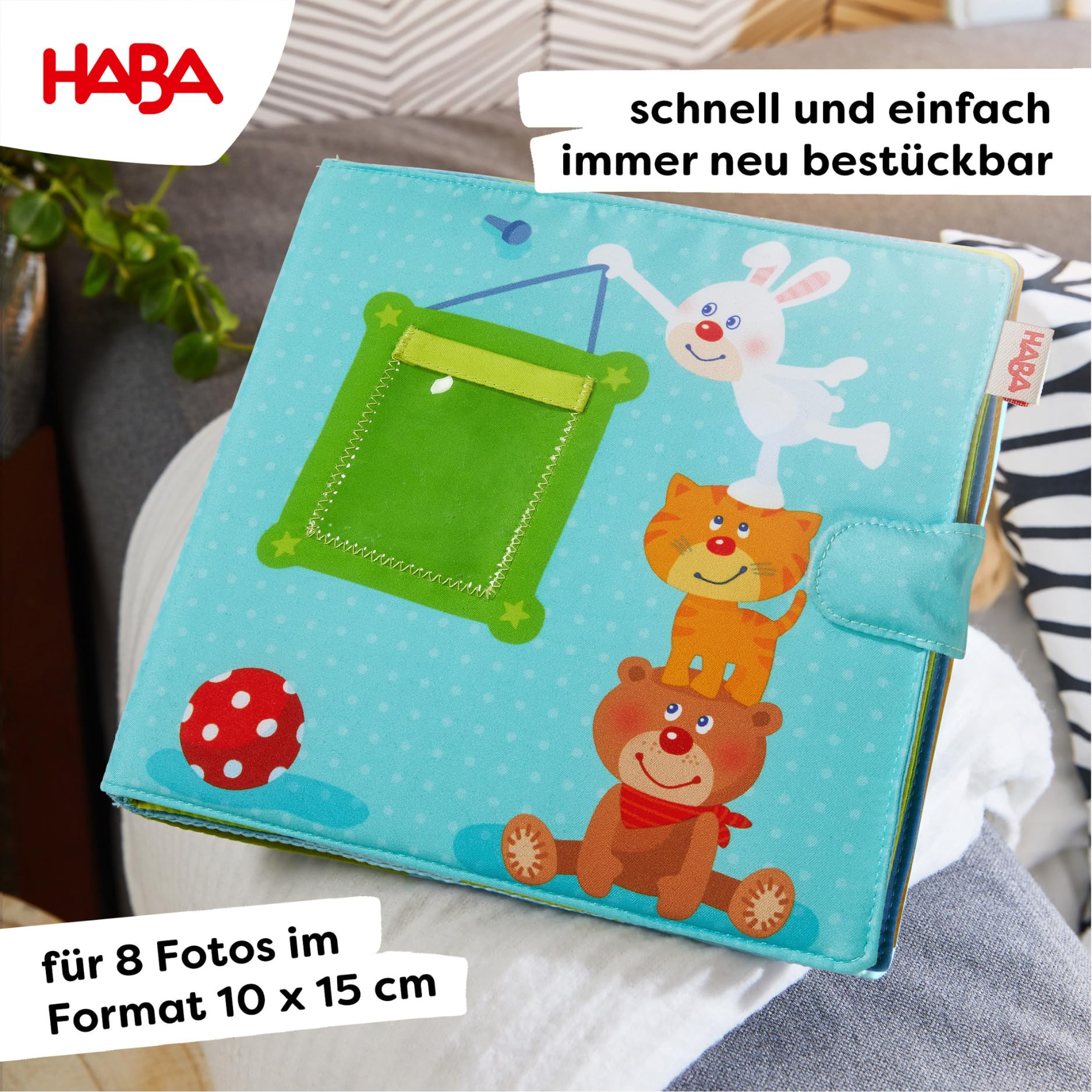 HABA My First Photo Album front-cover 2x2 photo slot shows a portrait highlight.