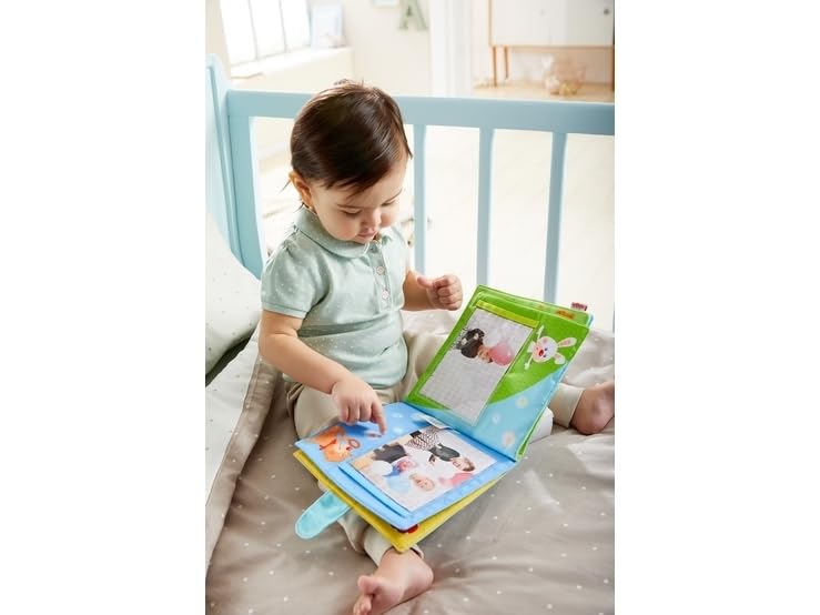 HABA My First Photo Album sliding pockets layout simplifies rearranging baby photos.
