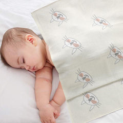 Hadetoto baby blanket swaddle-model demonstrating versatile usage for soothing and wrapping.
