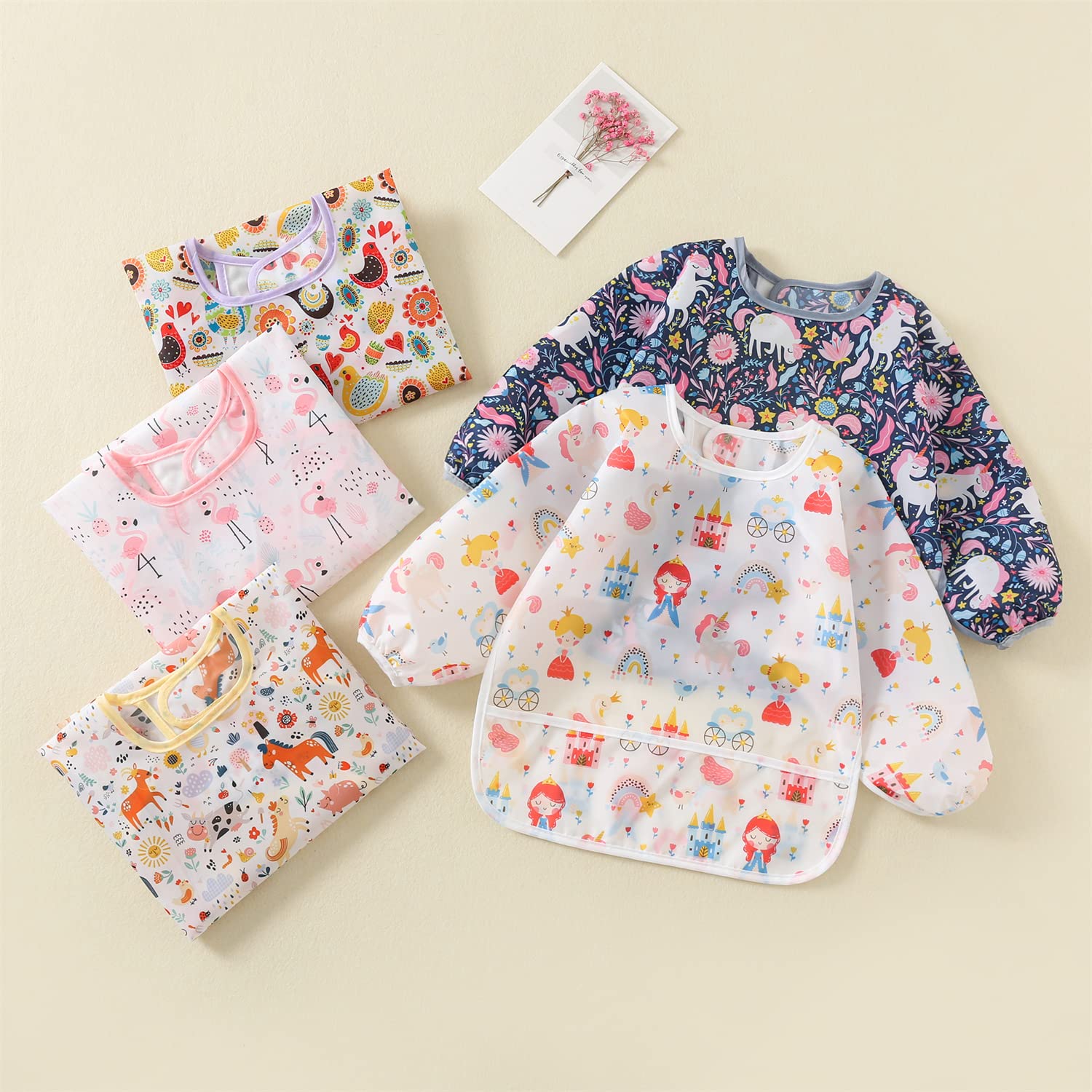 Hafftnun mealtime bib set designed for ages 6–30 months with full coverage.