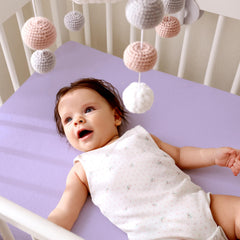 Hahafelt crib sheet on mattress with secure fit for uninterrupted sleep