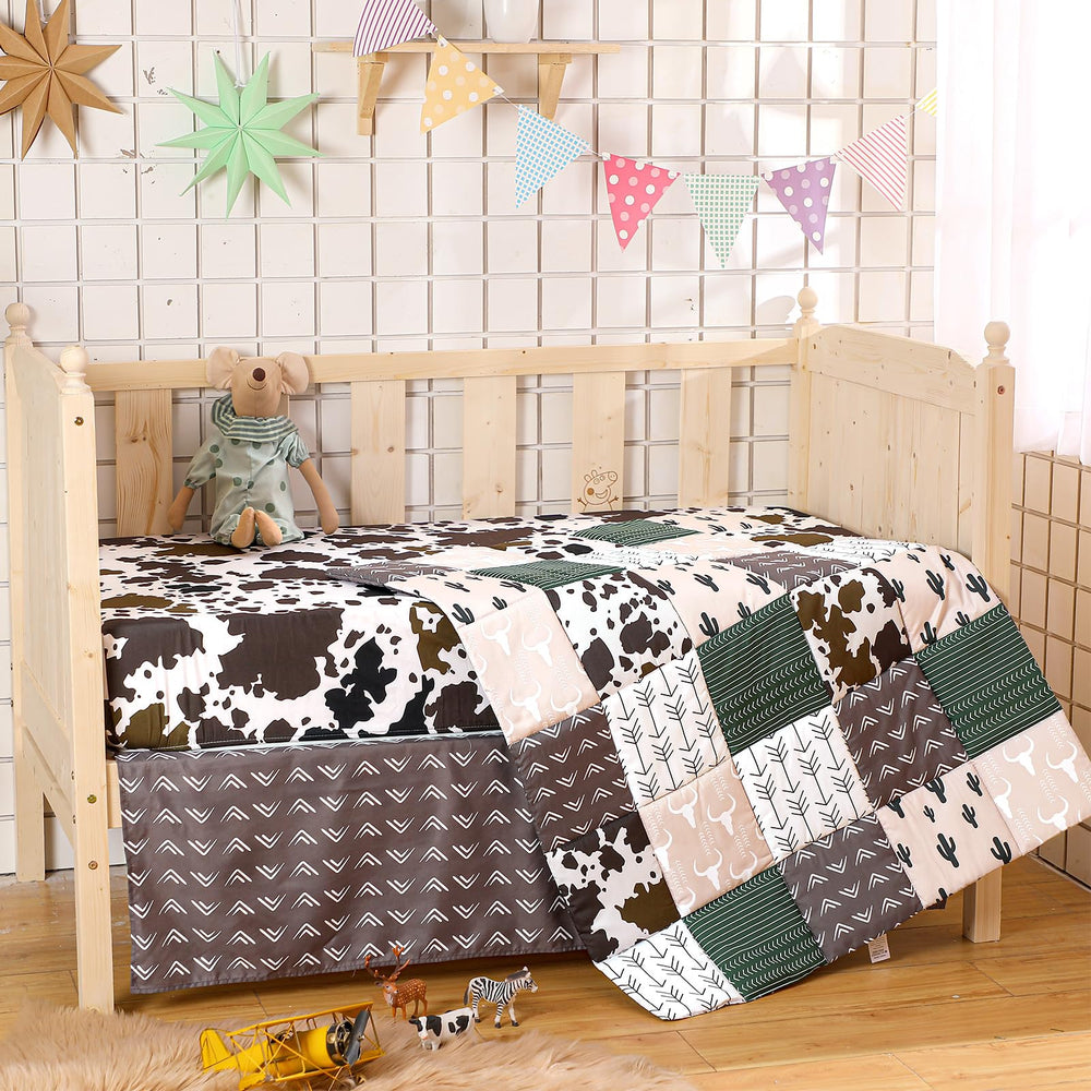 Hahafelt neutral cow cactus print quilt on display adds calming barnyard style