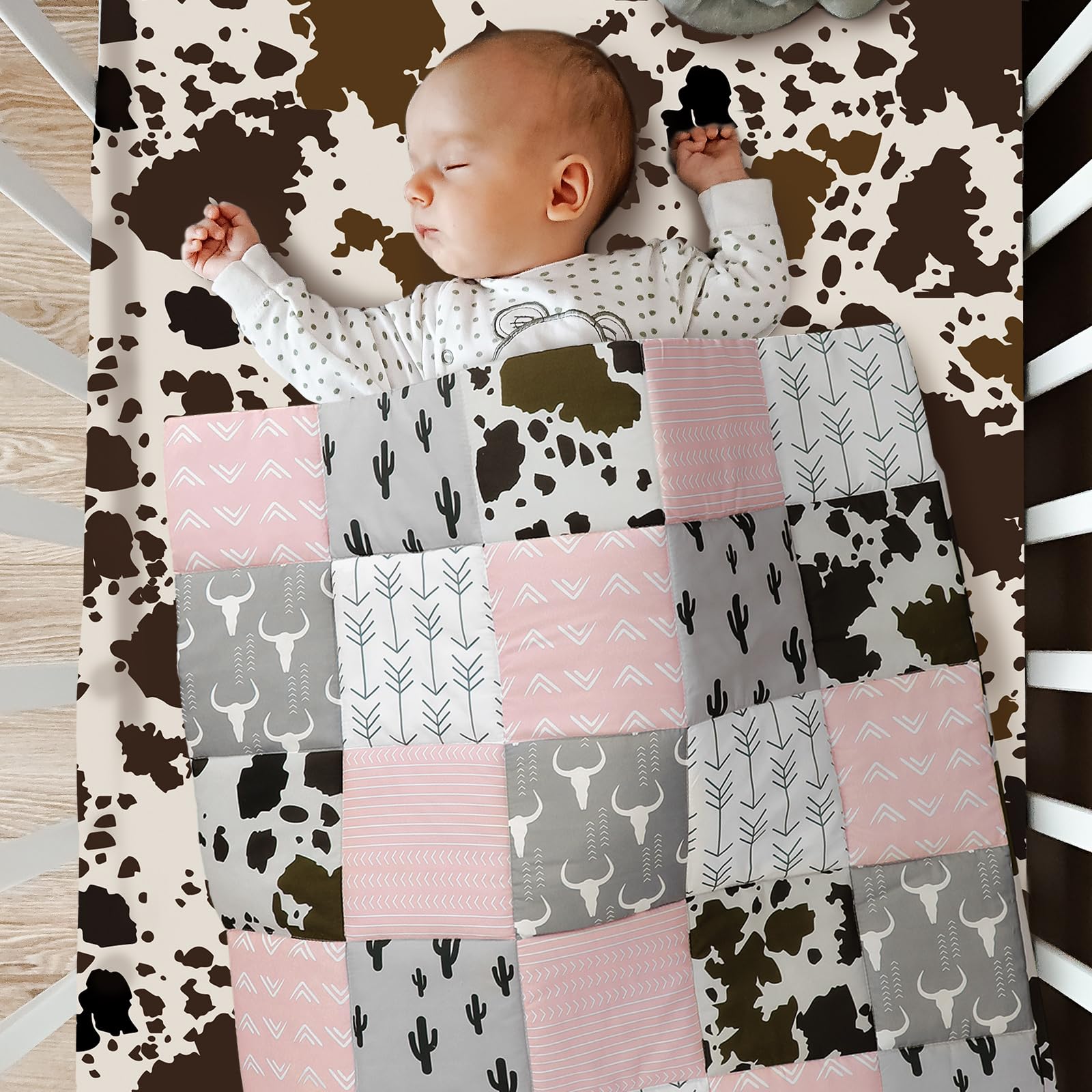 Hahafelt patchwork Western crib room setup showcases pink and gray nursery decor.