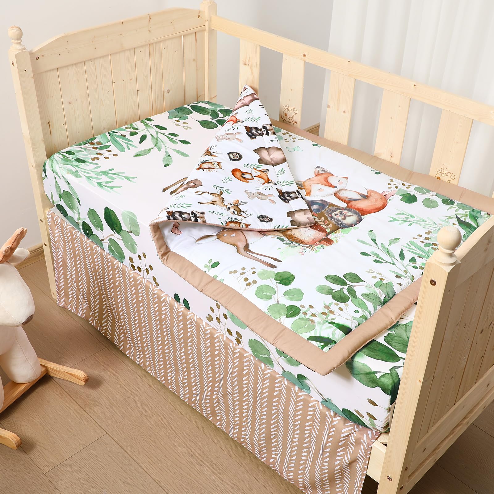 Hahafelt safari animals crib skirt on crib shows a polished woodland look