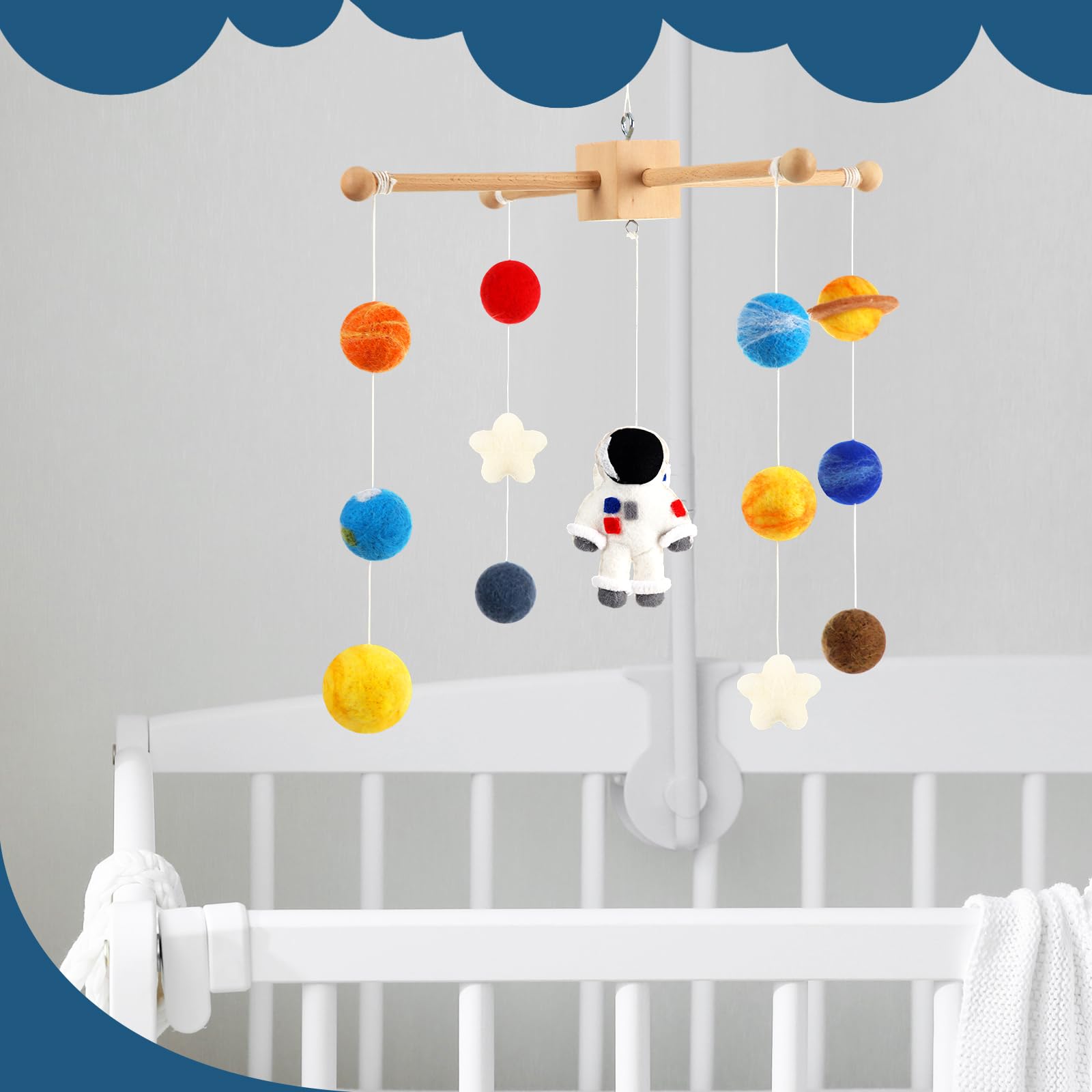 Hahafelt Space Nursery Mobile swinging-planets promote attentive tracking.