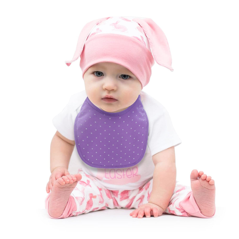 Hakochia bib being washed shows easy-clean and no-shrink promise.