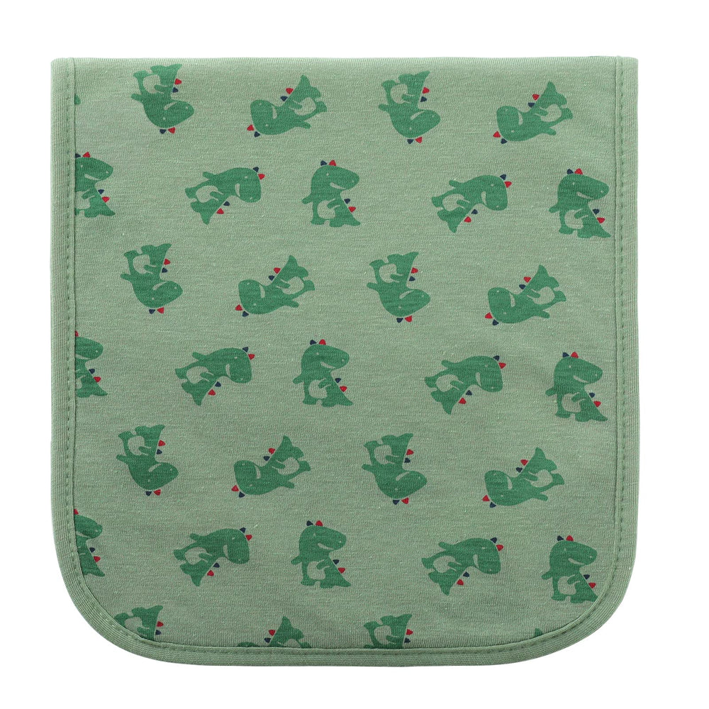 Hakochia burp cloths neatly stacked in a nursery setup.