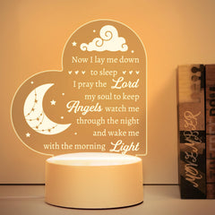 Hakumata baptism night light with heart-shaped plaque and warm glow on a shelf