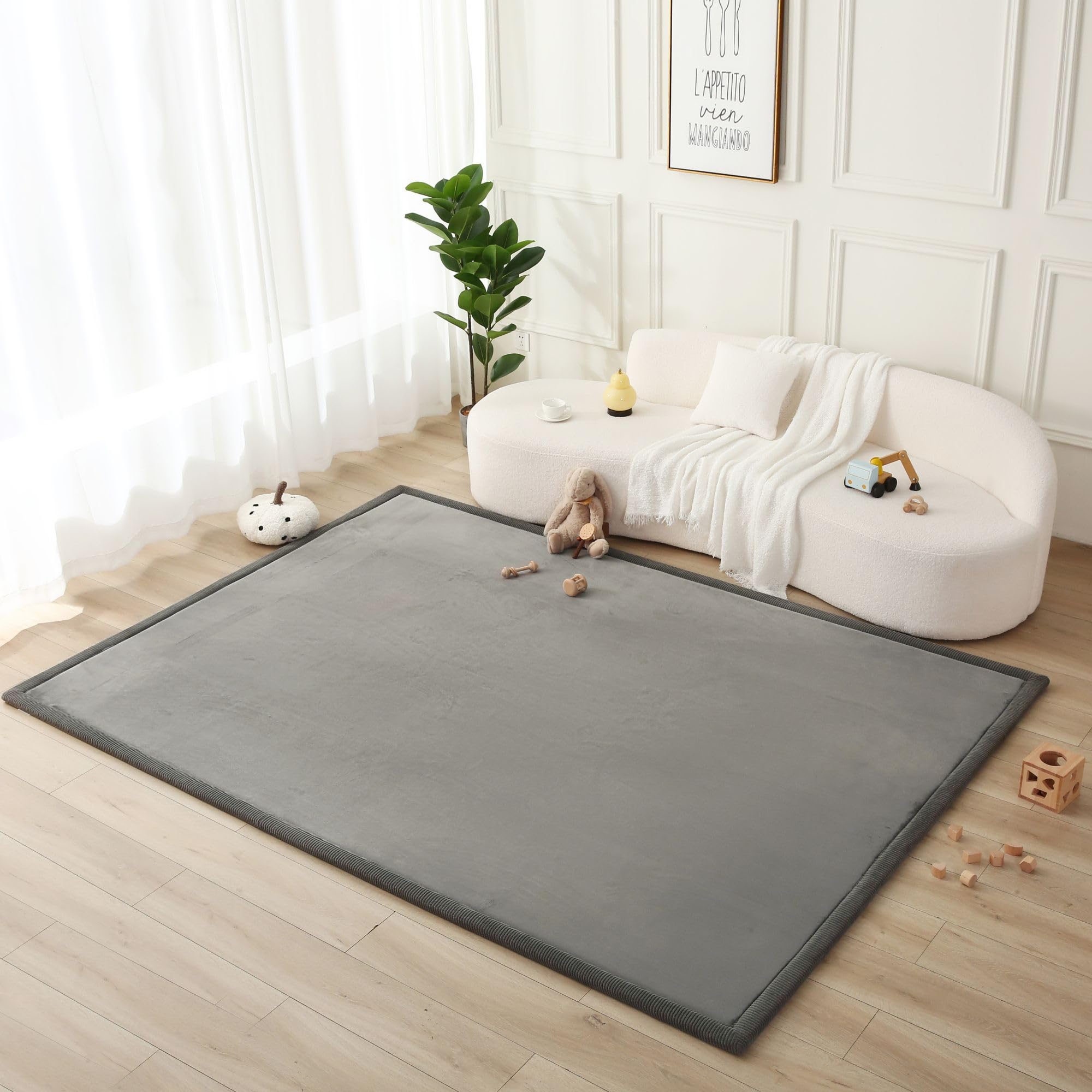 Hakuna Matte Premium Baby Playmat top view in dark gray supports tummy time and comfort.