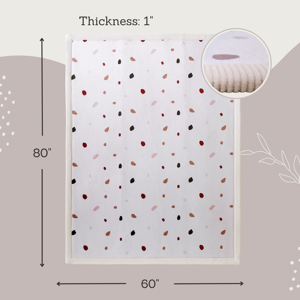 Hakuna Matte Coral Velvet Play Mat close-up highlights plush texture and skin-friendly fabric.