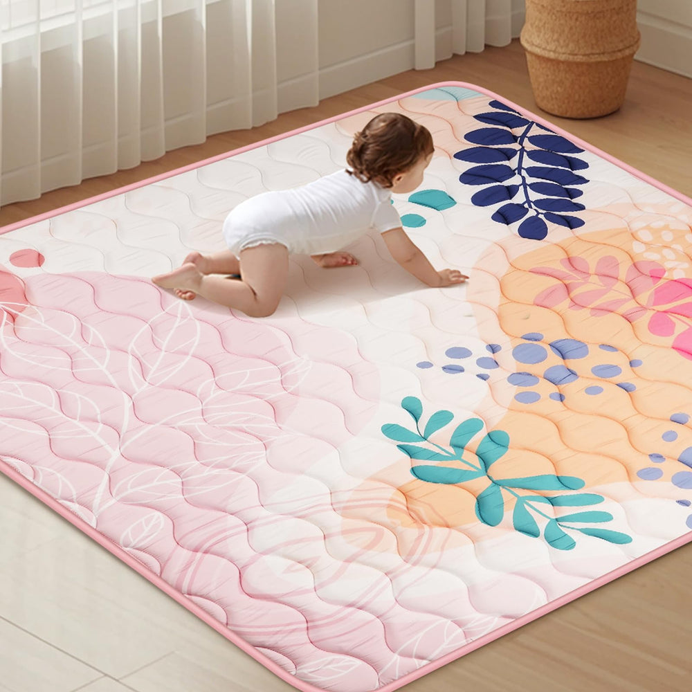 Haleeone Baby Play Mat 50x50 Pink folded for easy transport and storage.