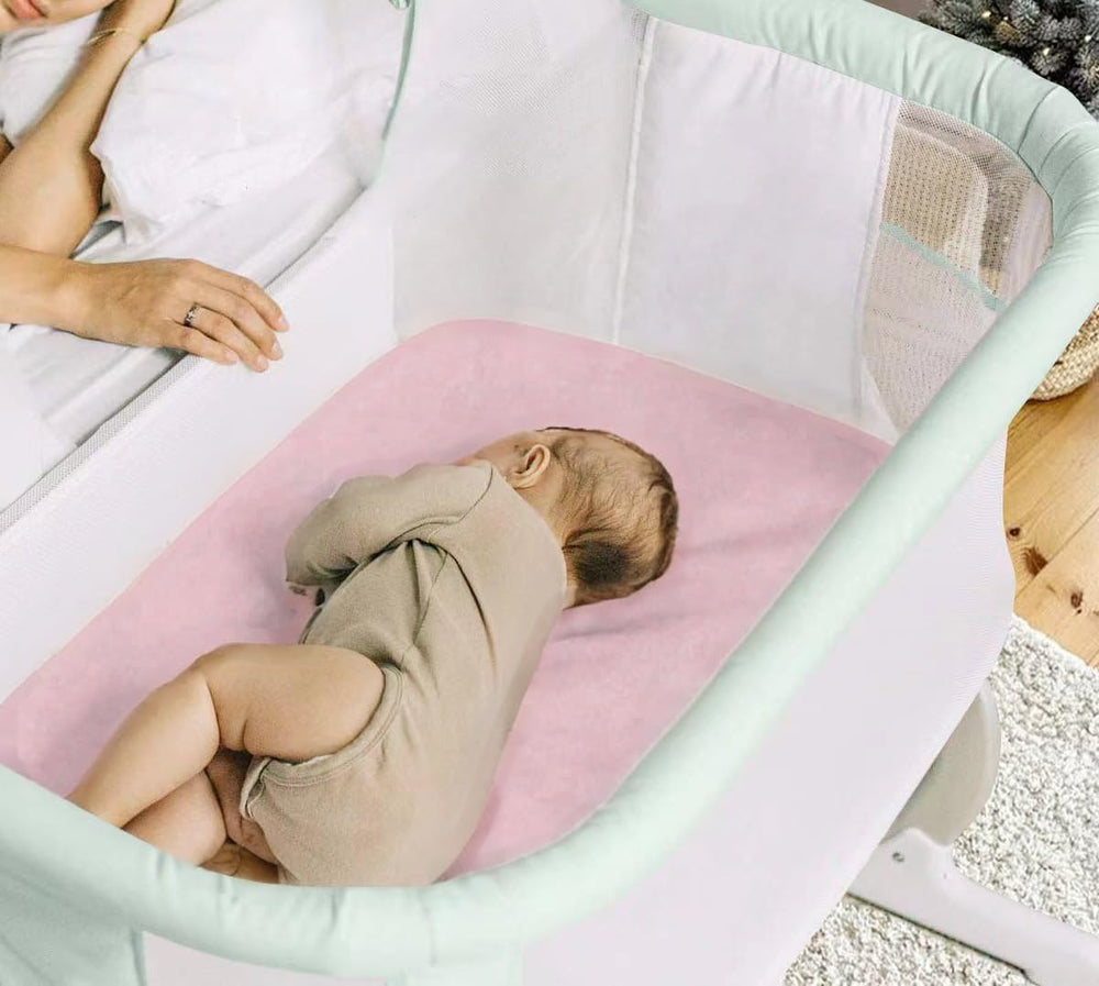 Haleeone bassinet sheets in use on a bassinet, clean and inviting.
