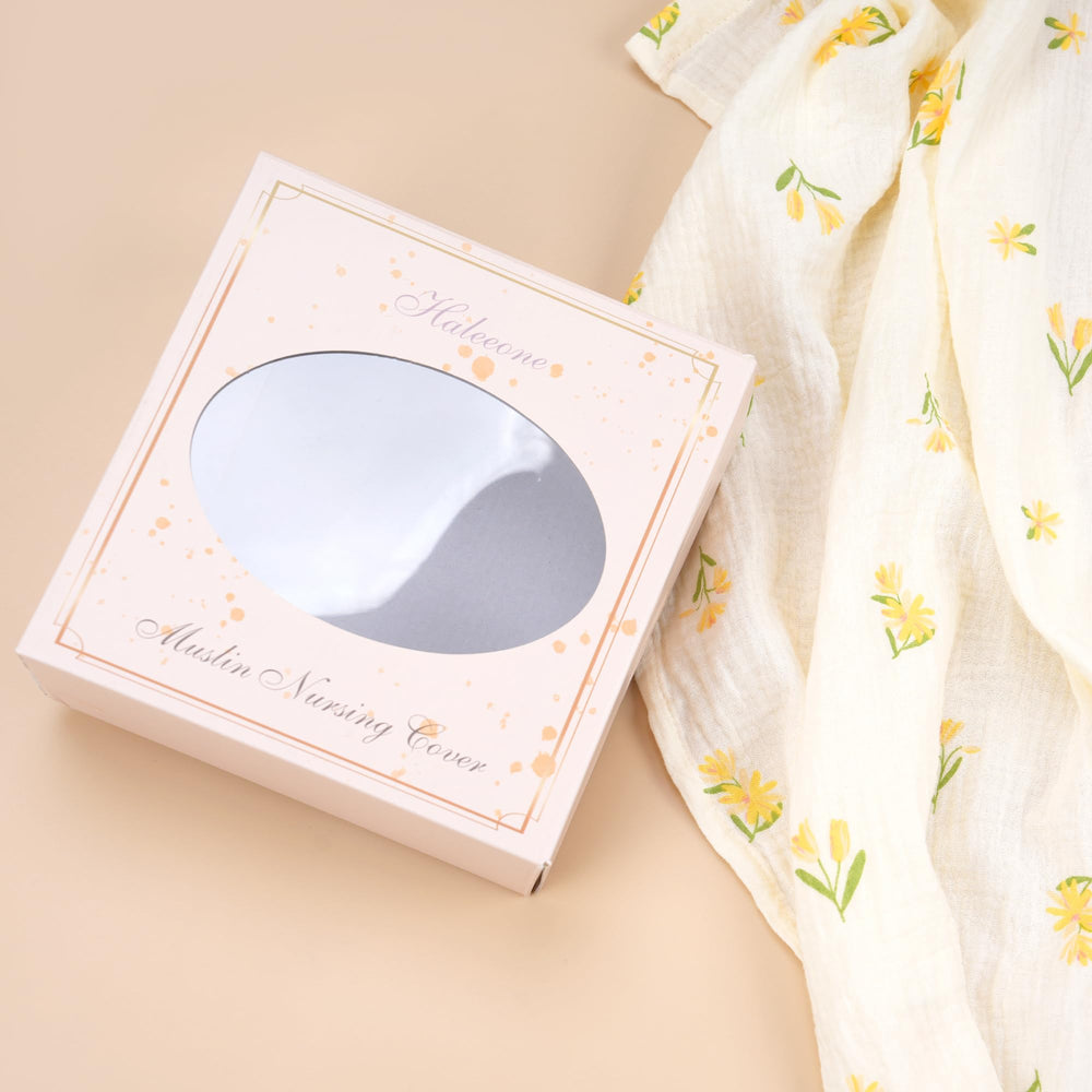 Haleeone nursing cover with arch neckline and adjustable strap enables comfortable eye contact.