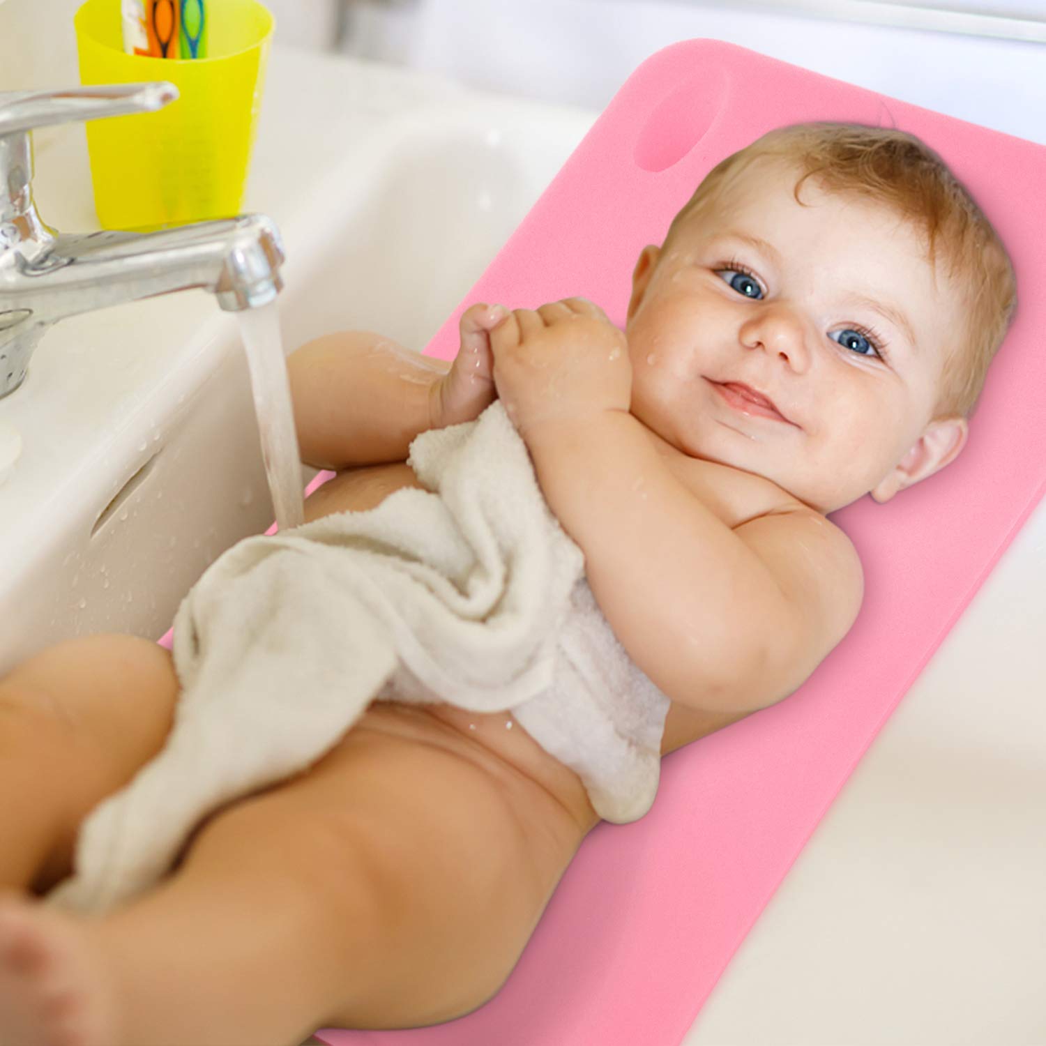 Hallo baby bath sponge pink fits in most bathtubs for versatile use.