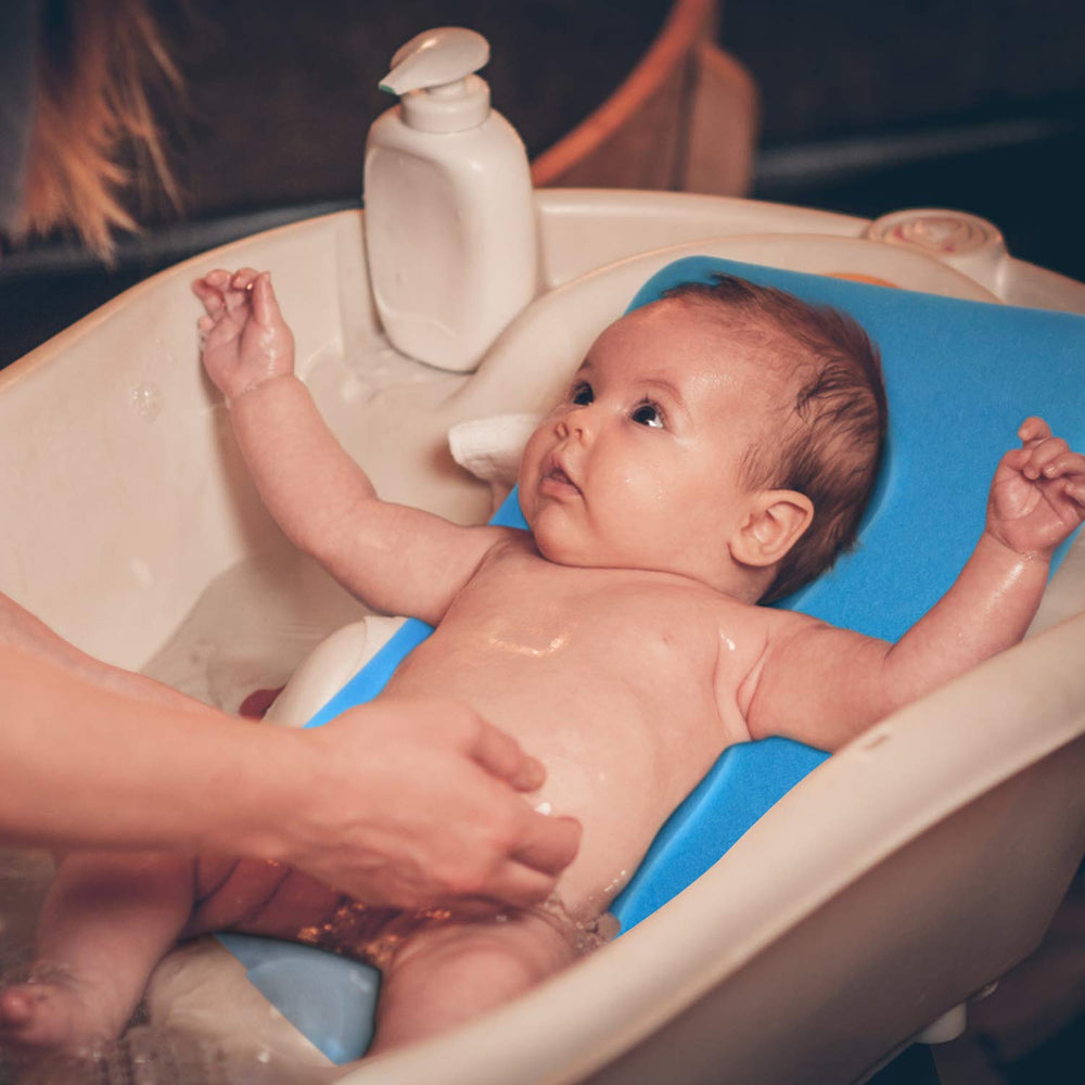 Hallo infant bath mat blue machine-washable for quick cleanups.