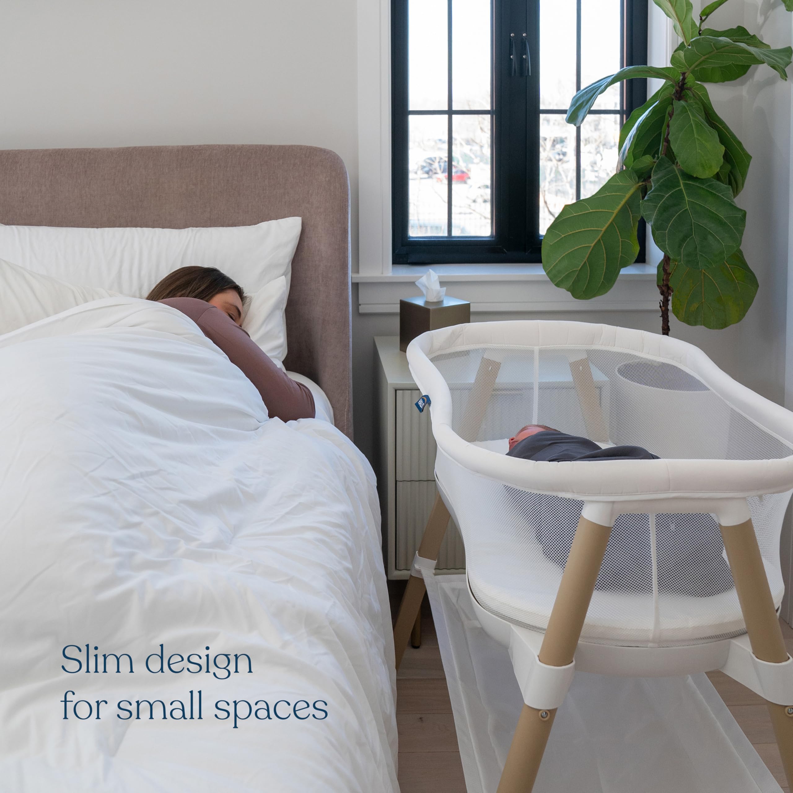 Halo BassiNest Essential Sleeper storage-shelf keeps diapers within reach.