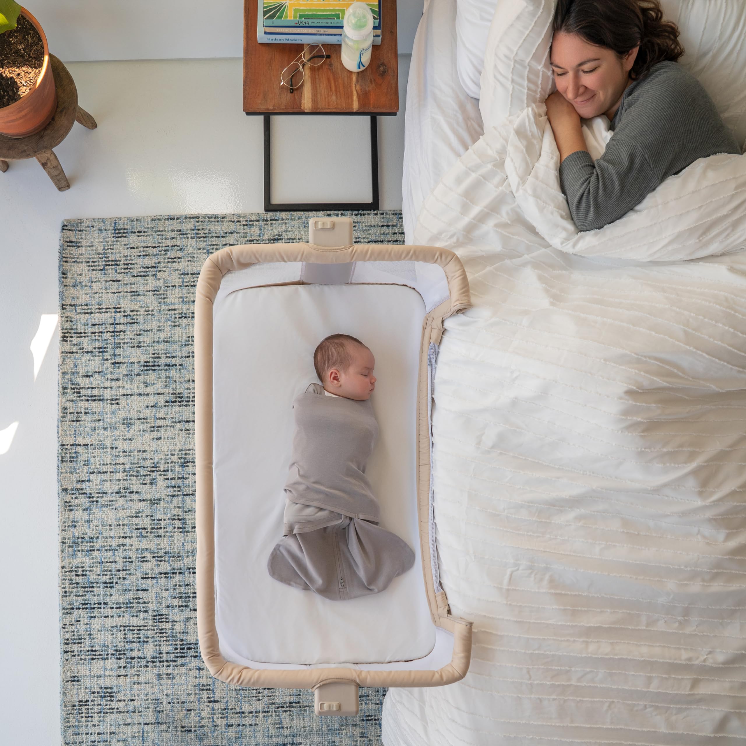 HALO BassiNest side-panel breathable mesh promotes airflow for close, comfortable sleep.