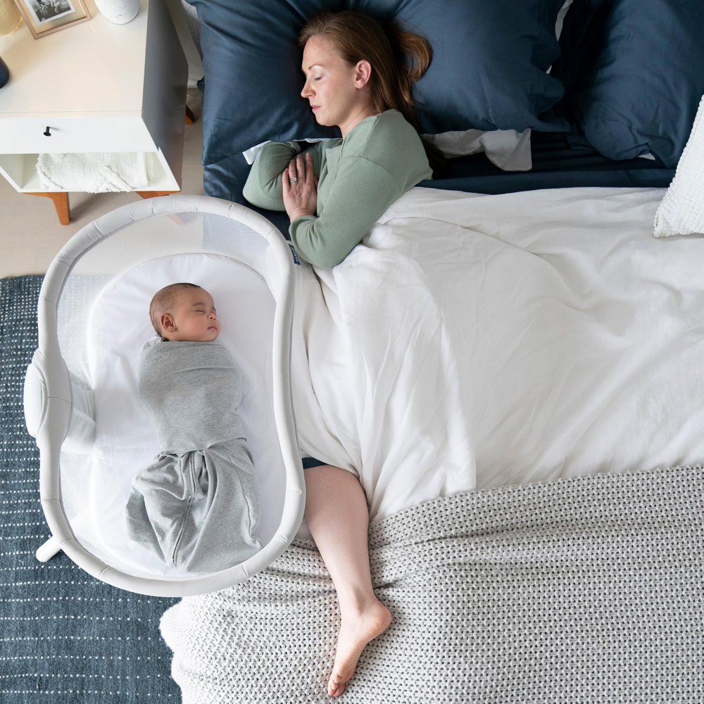 HALO BassiNest Swivel Sleeper 3.0 over-bed setup enables close, convenient nighttime care.