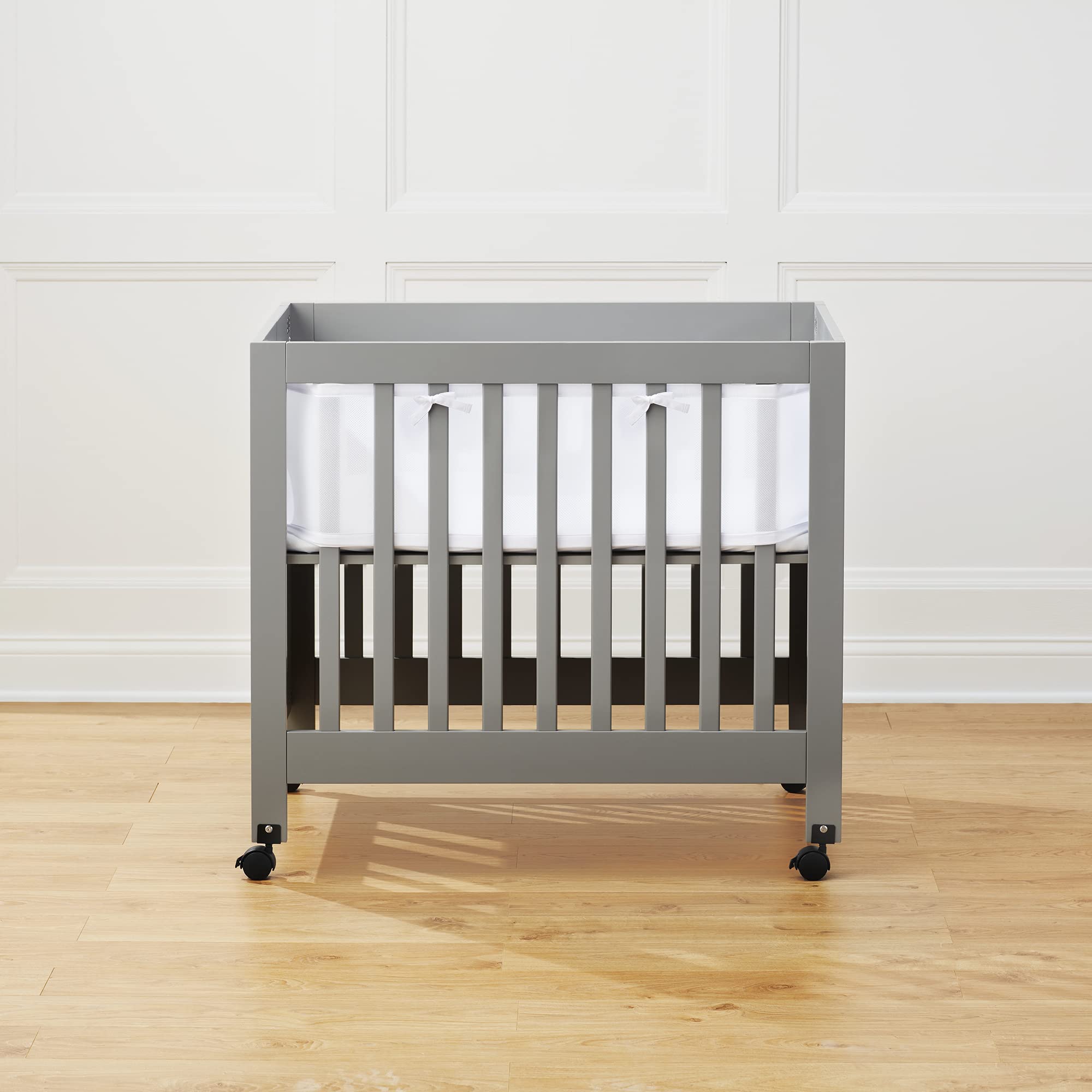 HALO BreathableBaby four-sided liner coverage for mini crib with 38x24 mattress.