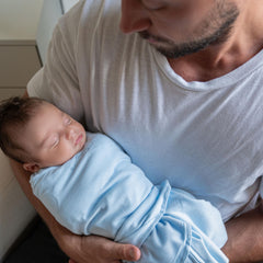 Halo Sleepsack Swaddle with one-arm-out supports self-soothing.