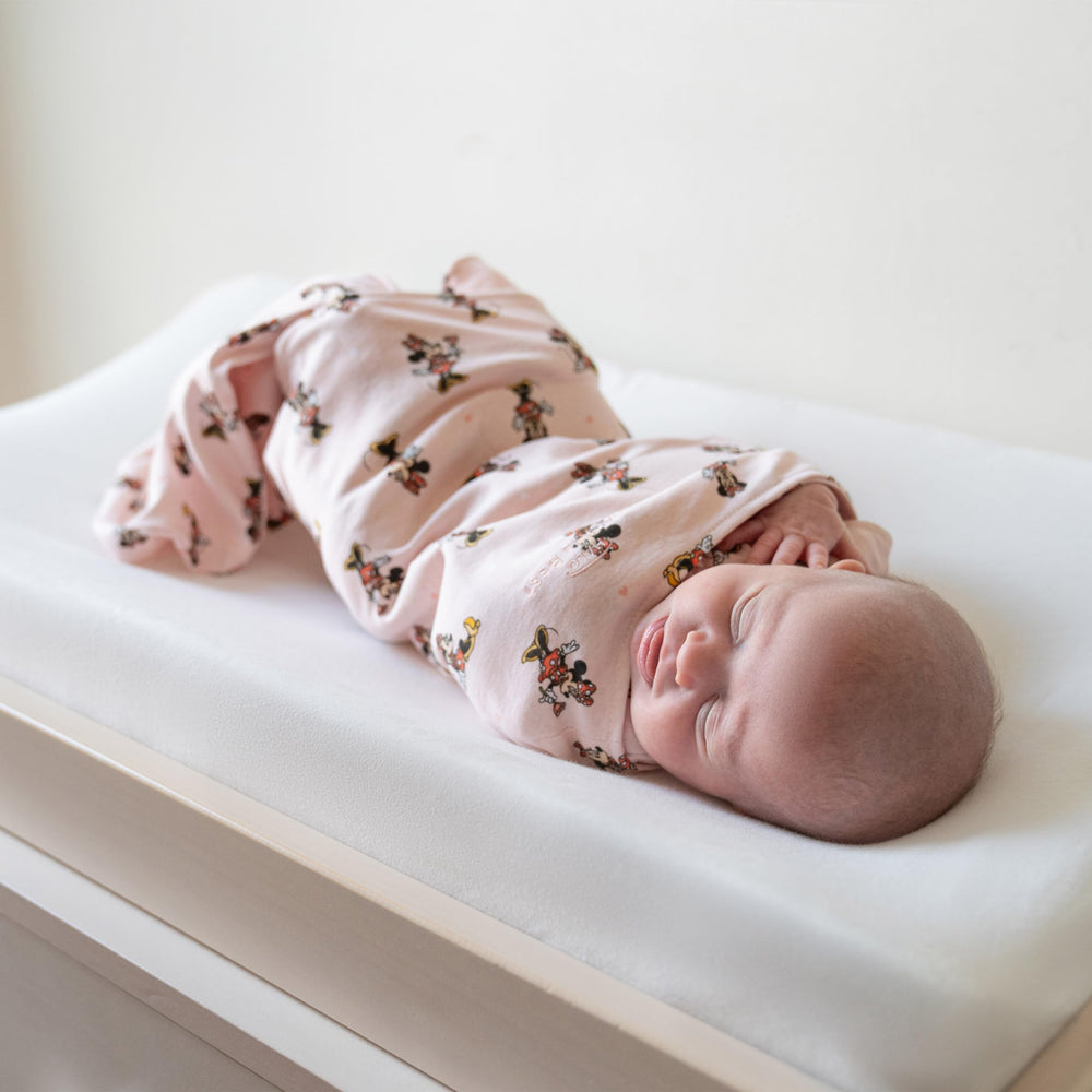 HALO Minnie Fun inverting zipper facilitates easy diaper changes without disturbing sleep.