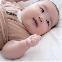 HALO SleepSack 3-way swaddle design demonstrates arms-in/out versatility for baby's preferred sleep position.