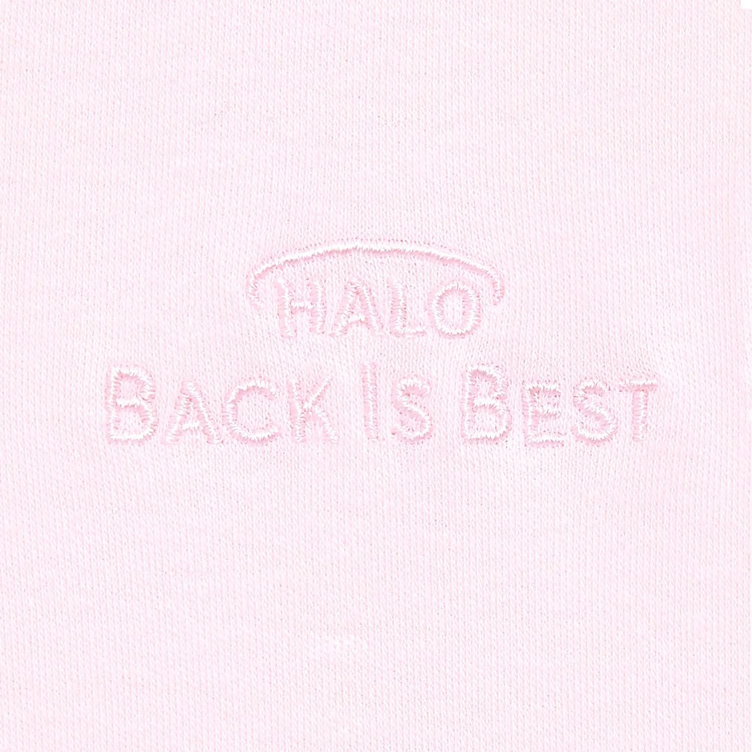 HALO SleepSack baby in softly lit crib at bedtime