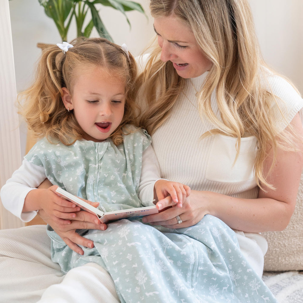HALO SleepSack bottom-zip diaper-change scene for quick, gentle night-time access