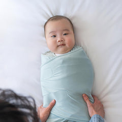 HALO SleepSack SuperSoft Swaddle 3-way design supports arms-in, arms-out, or hands-to-face sleeping.