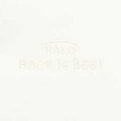 HALO Sleepsack Swaddle arms-in shows secure fit that reduces startling reflex