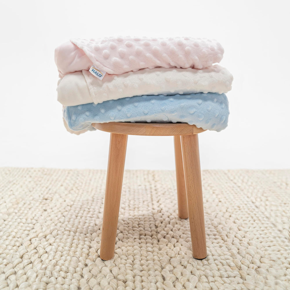 HALO Sleepsack Swaddle 3-way adjustment arms-in concept—easy transitions between sleep styles.