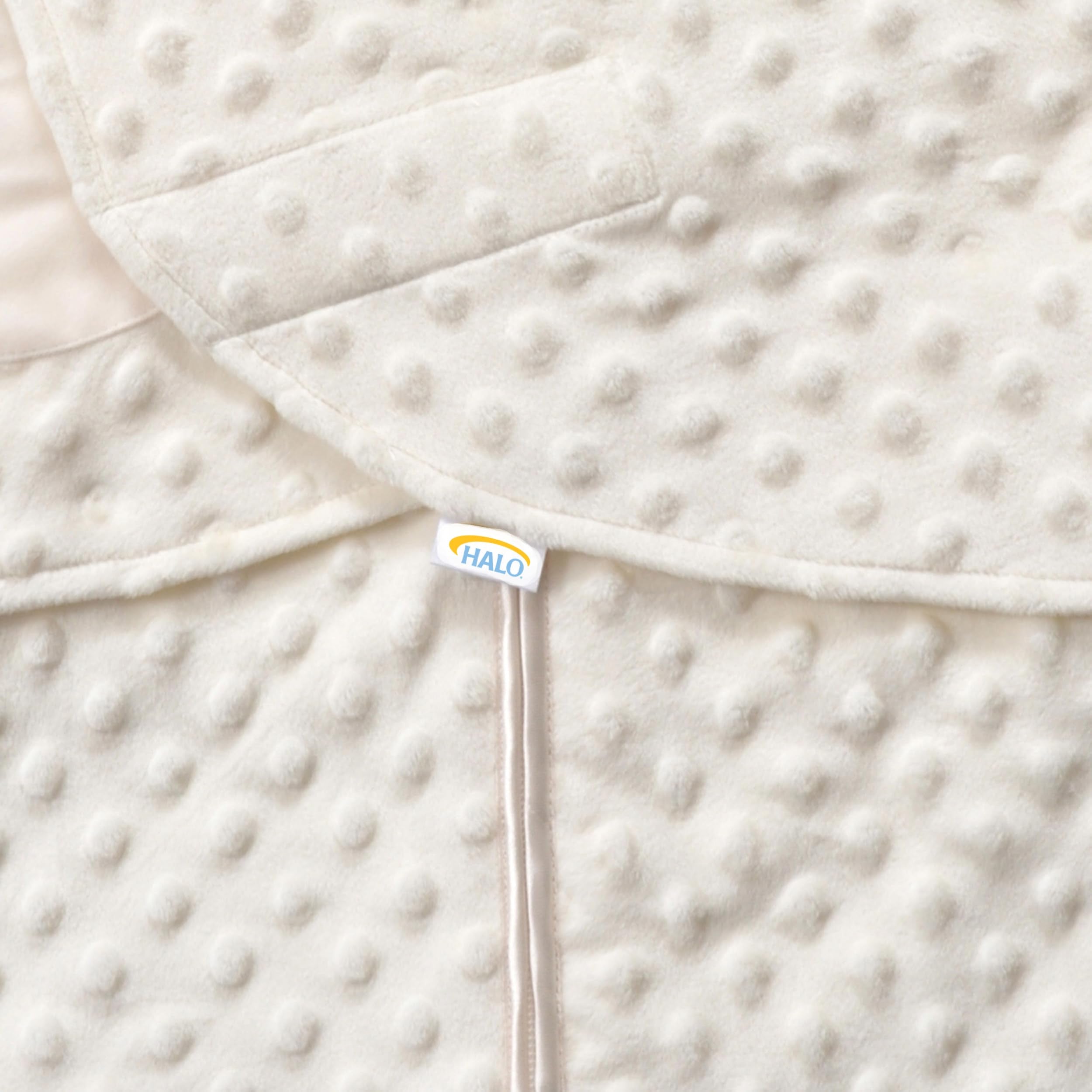 HALO Sleepsack Swaddle bottom-zip—diaper changes without fully unwrapping.