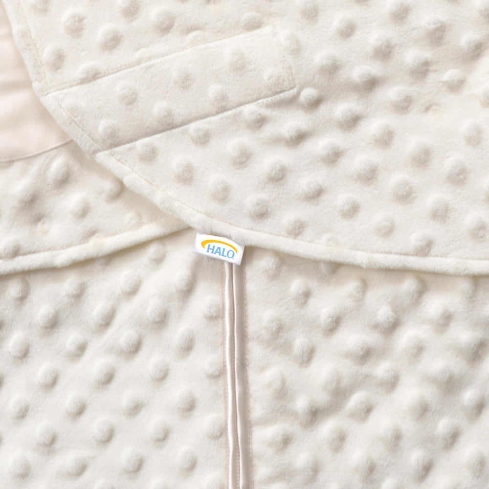 HALO Sleepsack Swaddle bottom-zip—diaper changes without fully unwrapping.