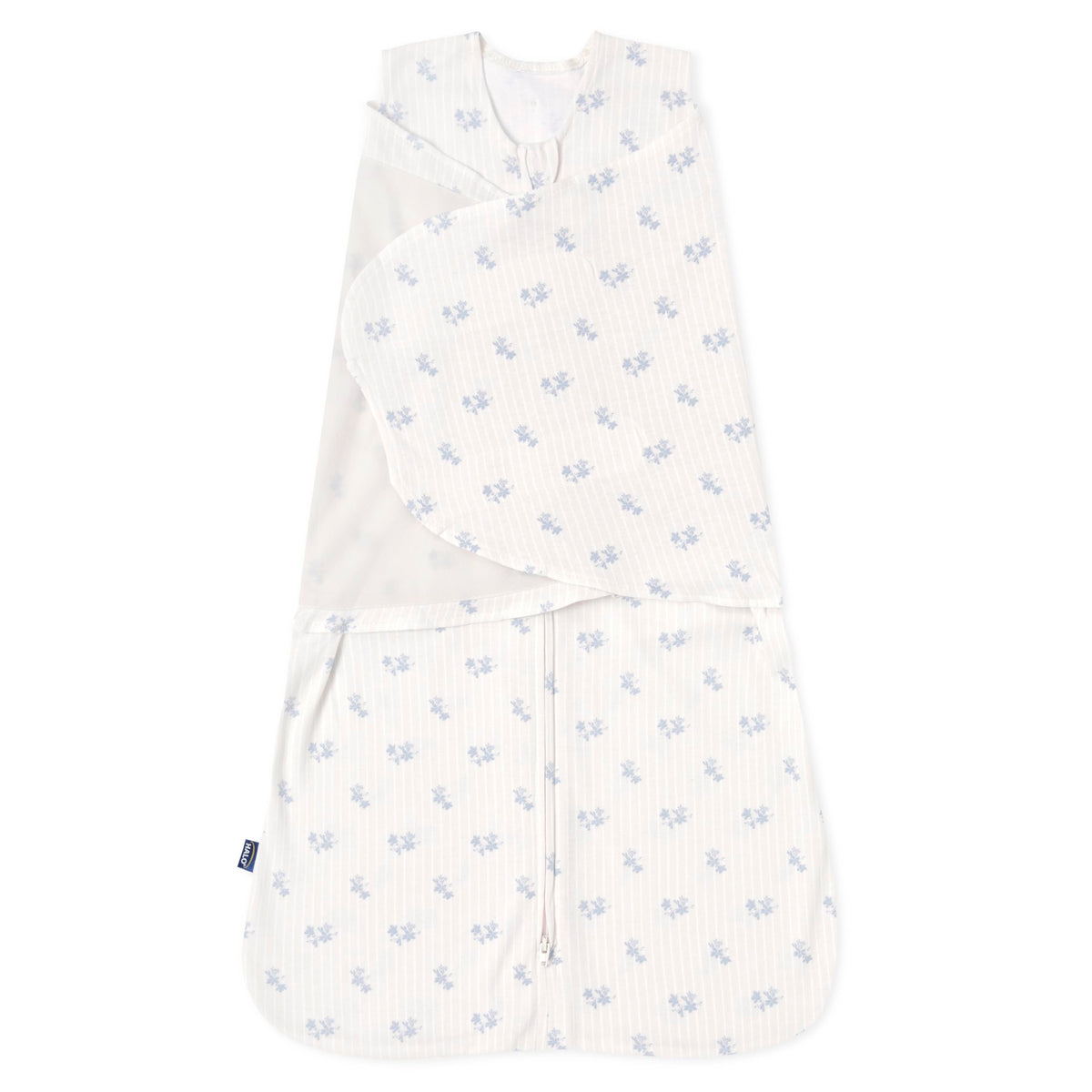 HALO Sleepsack Swaddle Floral Vintage Stripe seen for secure newborn sleep with soft cotton.