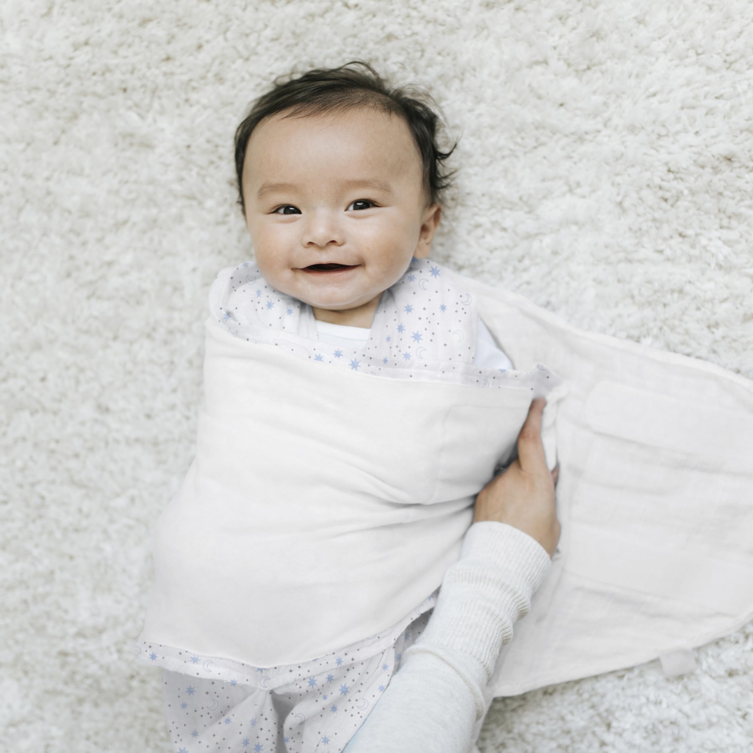 HALO Sleepsack Swaddle Midnight Moons Blue back view highlights snug arms and neck fit