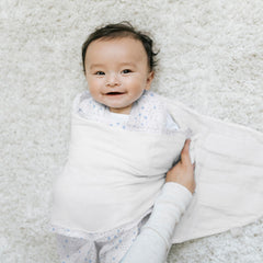 HALO Sleepsack Swaddle Midnight Moons Blue back view highlights snug arms and neck fit