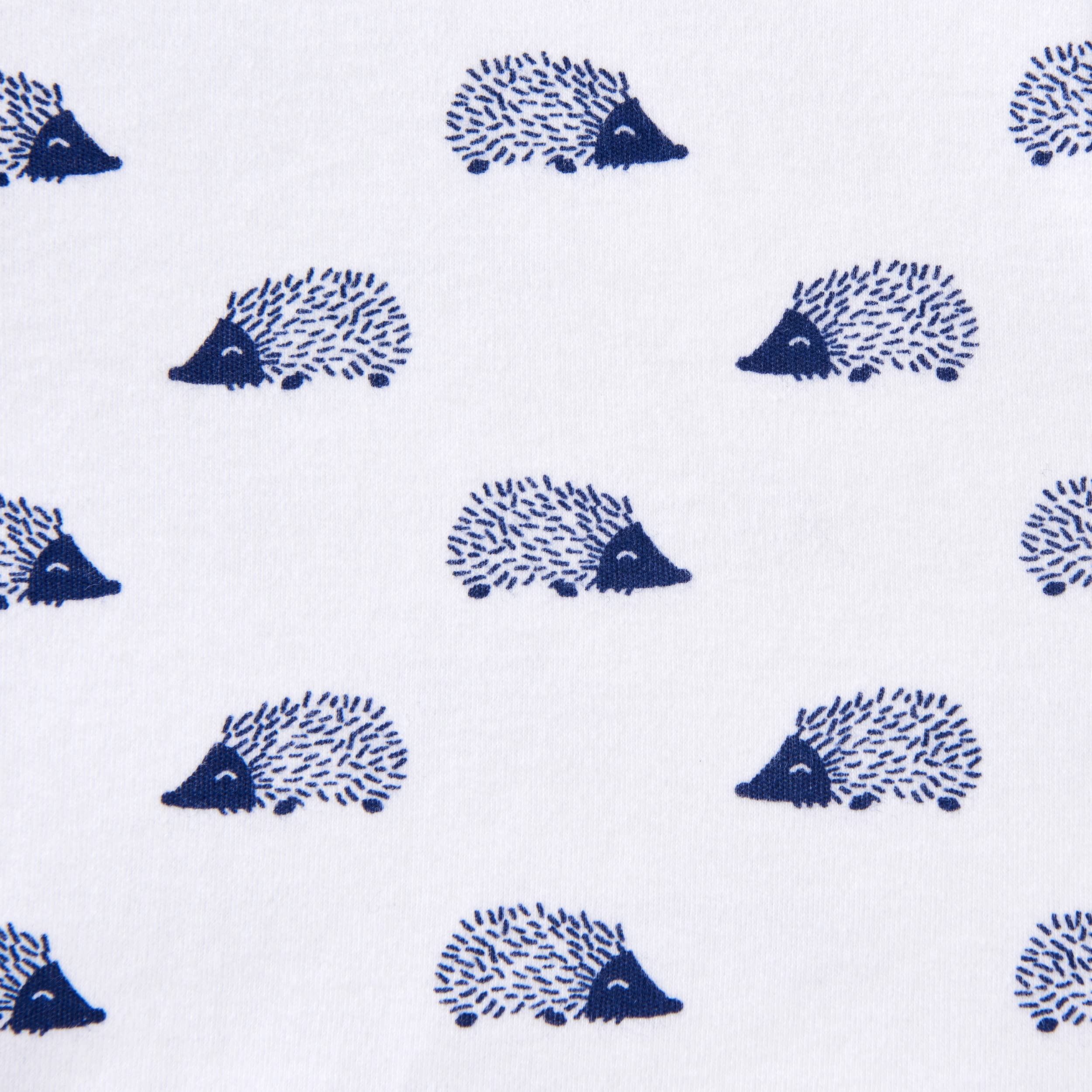 HALO Sleepsack Swaddle Navy Hedgehog wrapped view emphasizes cozy sleepwear.