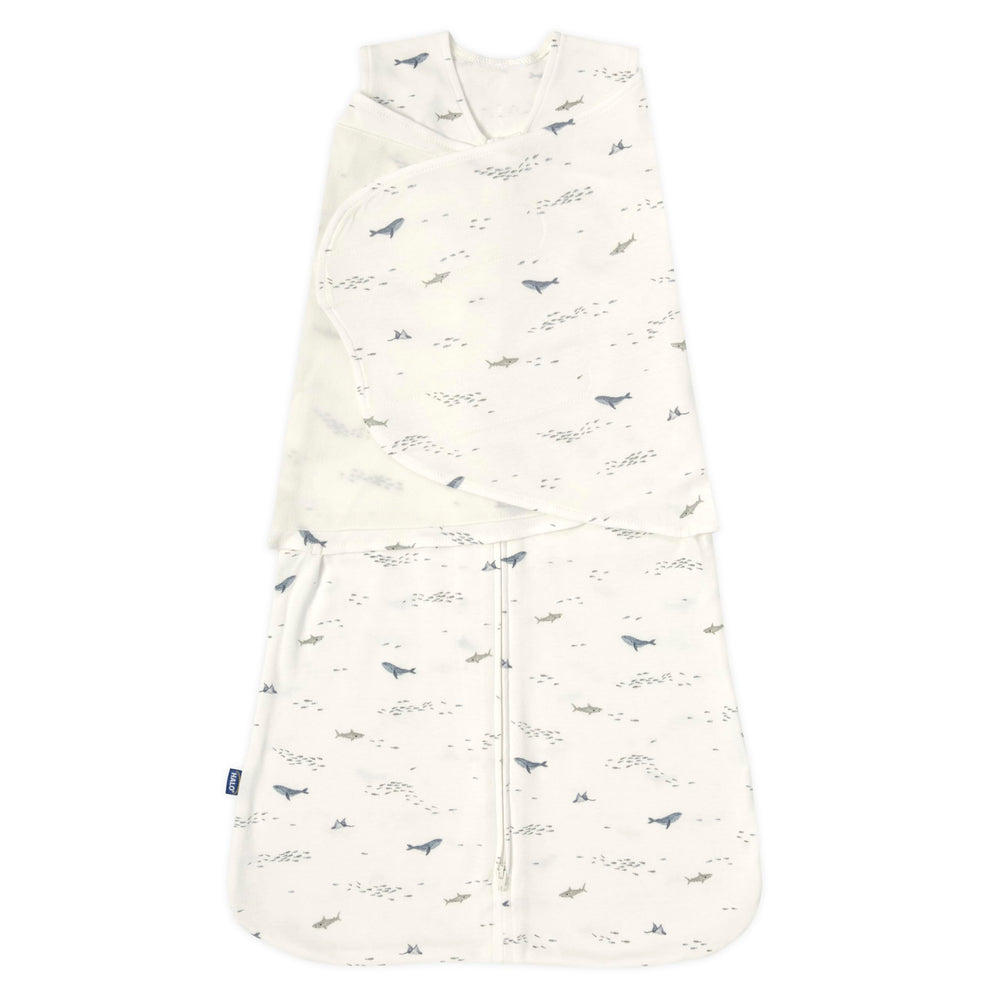 HALO Sleepsack Swaddle Ocean Life pattern closeup showing breathable cotton feel for safe sleep