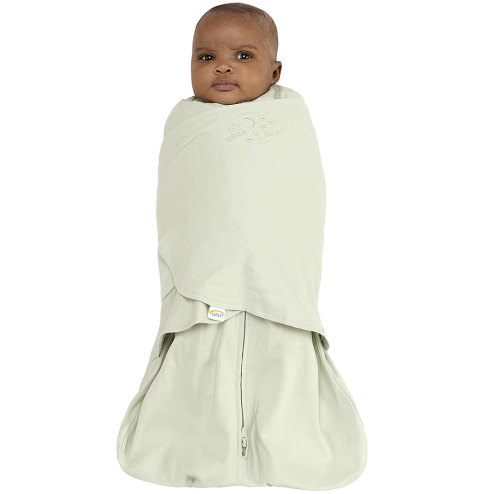 HALO Sleepsack Swaddle sage arms-in fit demonstrates secure wrap for restful sleep.