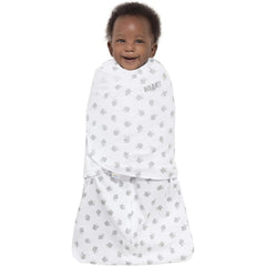 HALO Sleepsack Swaddle three-way adjustment demonstrates arms-in one-arm-out and two-arms-out options.