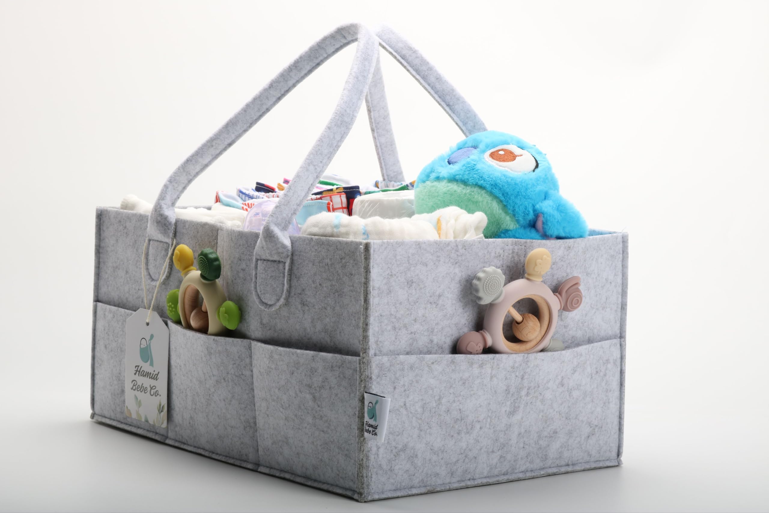 Hamid Bebe Co diaper caddy ideal for car trips and travel storage.