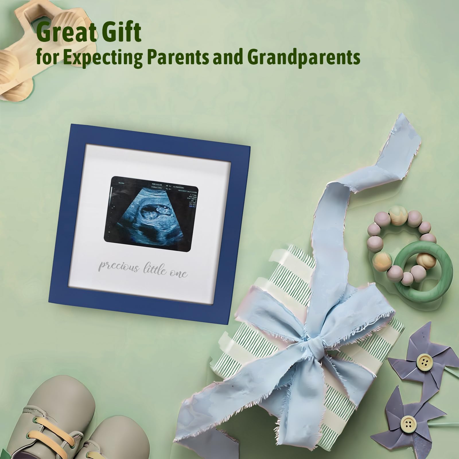 HAMUIERS Blue wooden frame serves as nursery decor and memory keepsake.
