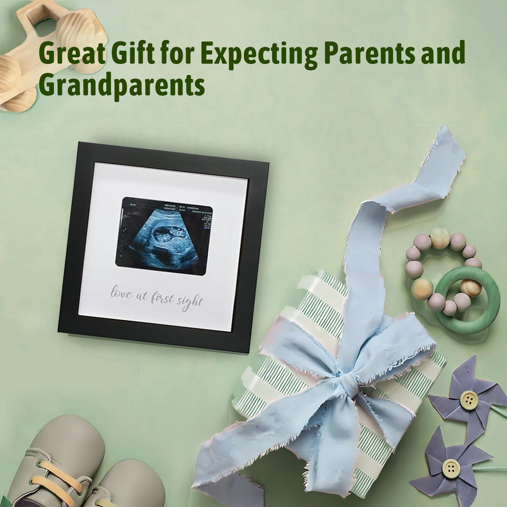 HAMUIERS Love at First Sight frame used as nursery decor with a sonogram photo.